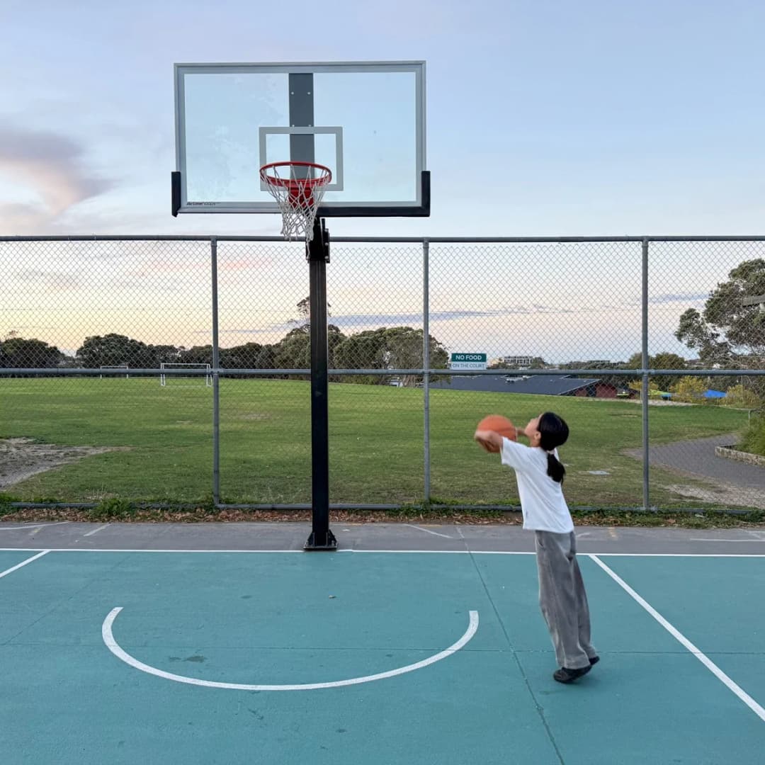 Her first basketball experience - new but enjoyable!